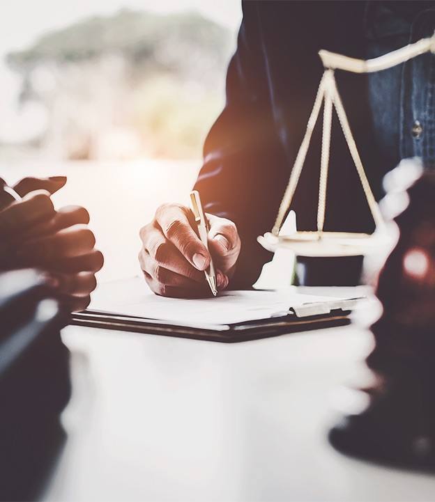 Man signing documents to modify prior orders by blair parker law in houston, texas.
