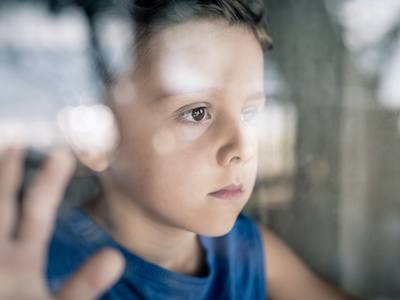 Boy waiting to be reunited with family after waiting on CPS defense for foster care by blair parker law in houston, texas.