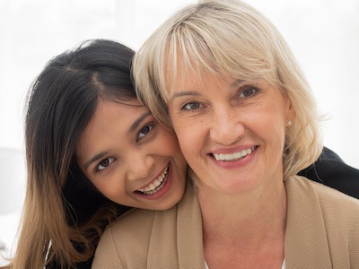 Mother and stepchild legally united after working with adoption attorney