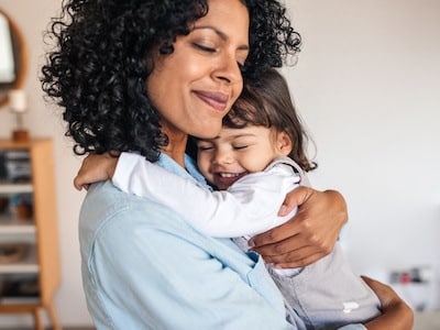 Mother holding child wanting to know how will I know if my CPS investigation is closed?