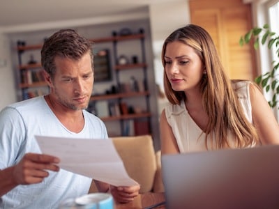 Remarried husband and wife review letter about remarriage after divorce affecting original settlement