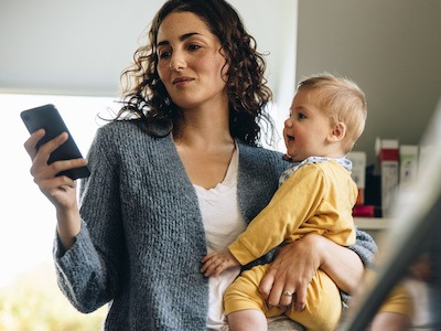 Mom holding child looking for information on what CPS can and cannot do in Texas