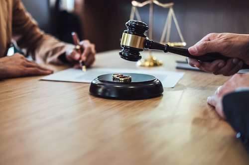 A woman preparing to finalize the divorce after starting with a divorce attorney consultation