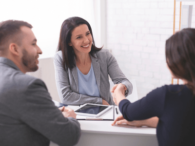 Pearland divorce lawyer meeting with clients.