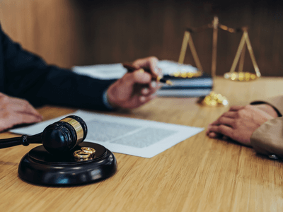 Person receiving legal support from a divorce lawyer after initially working with a divorce mediator