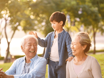 Hopeful adoptive grandparents with their grandchild.