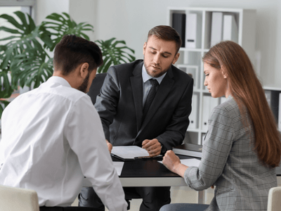 Spouses starting the stages of the divorce process.