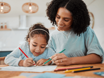 Mom and daughter drawing and coloring