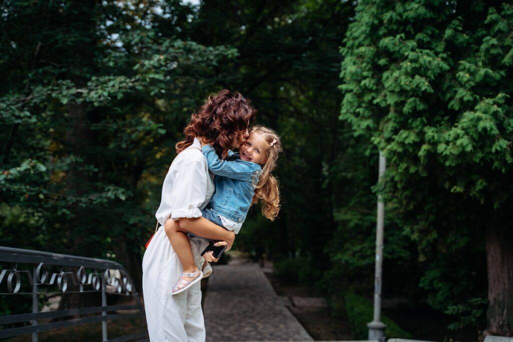 Mom hugging her daughter