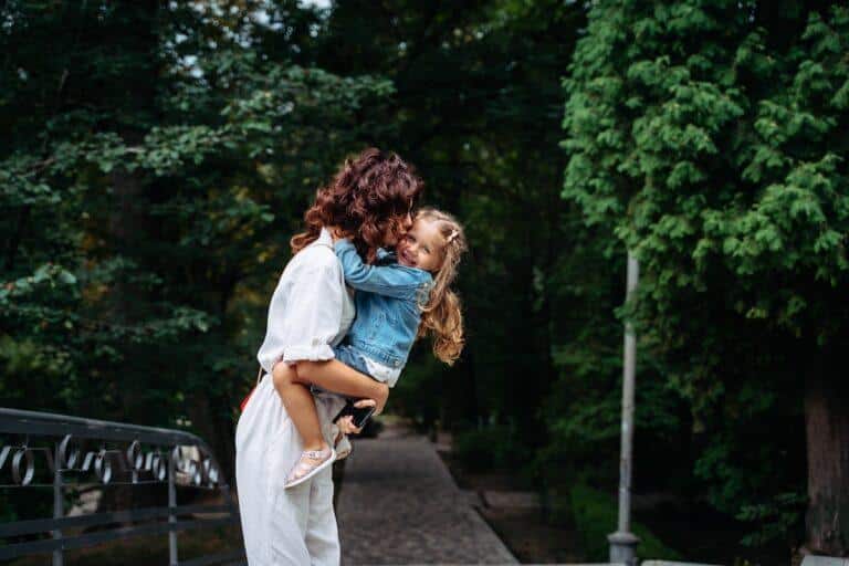 Mom hugging her daughter